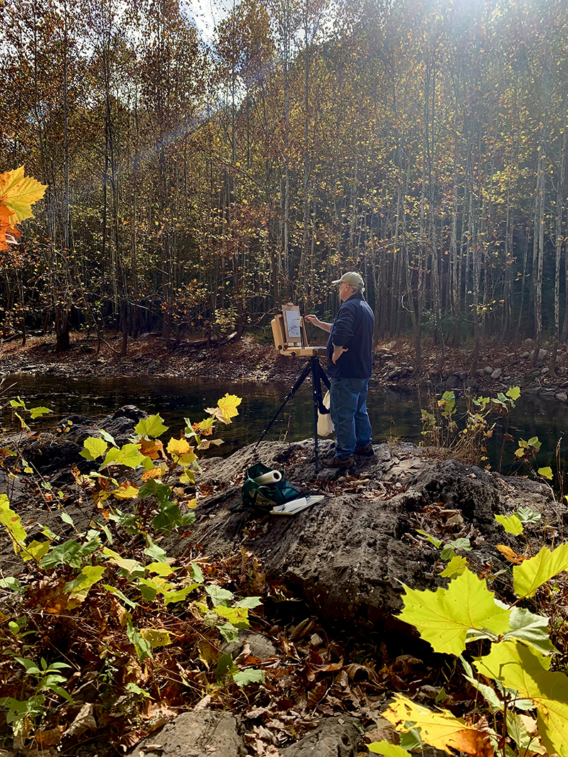 Steve Painting at a stream